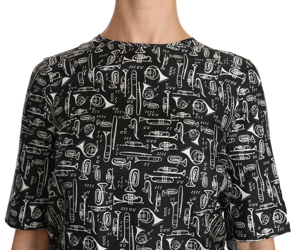 Dolce & Gabbana Schwarze Seidenbluse mit Musikinstrumenten-Druck