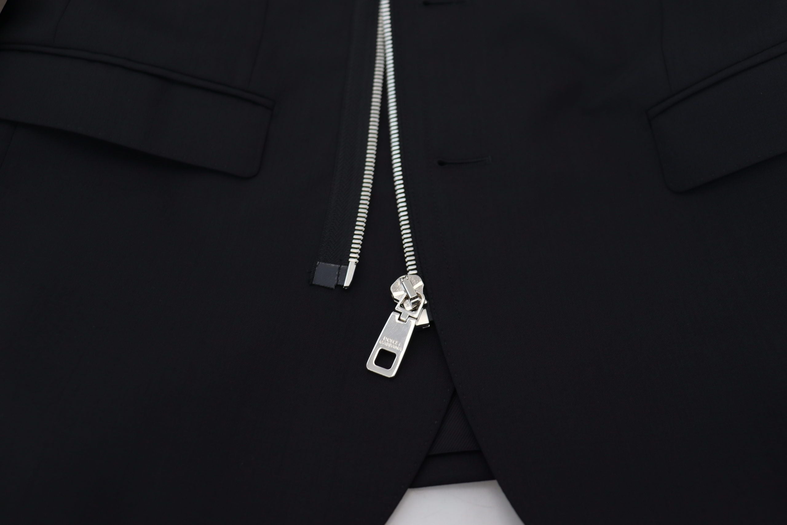 Dolce & Gabbana Schwarze Wolljacke mit durchgehendem Reißverschluss und langen Ärmeln