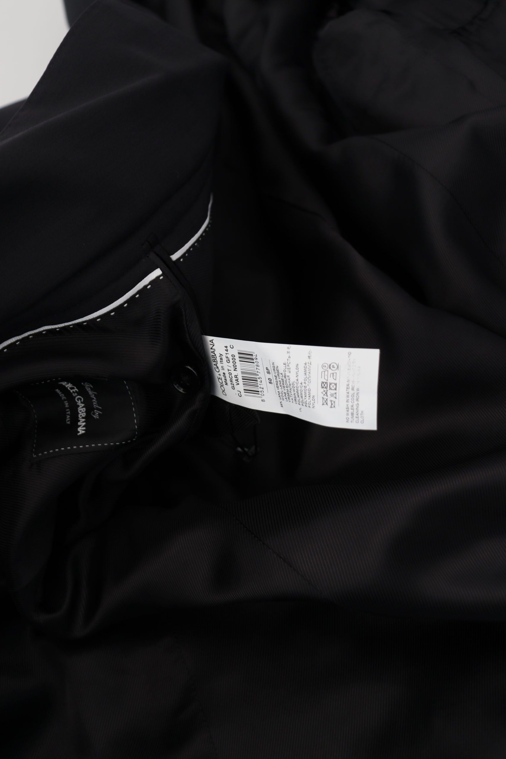 Dolce & Gabbana Schwarze Wolljacke mit durchgehendem Reißverschluss und langen Ärmeln