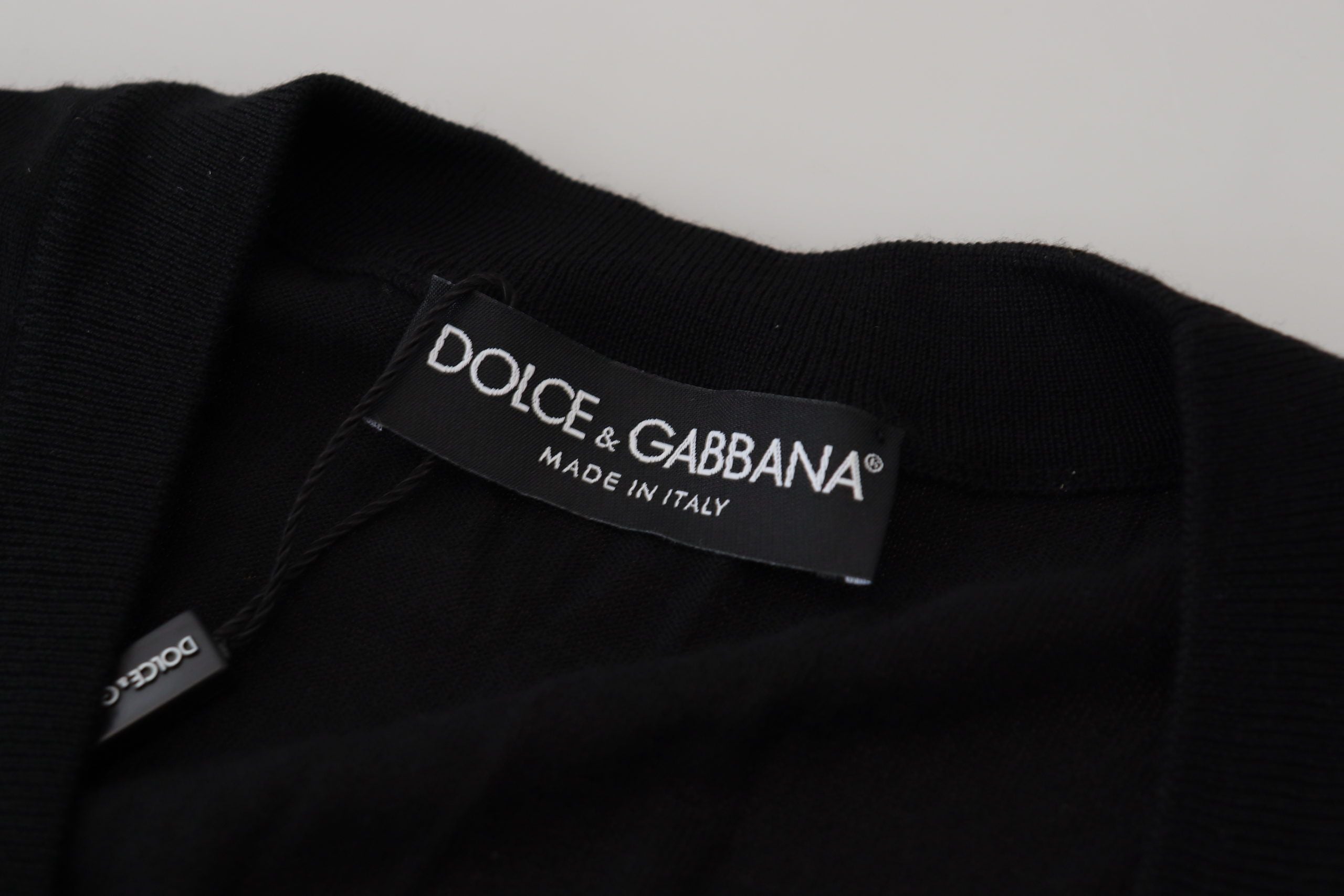 Dolce & Gabbana Schwarze Strickjacke aus Wolle mit Knopfleiste