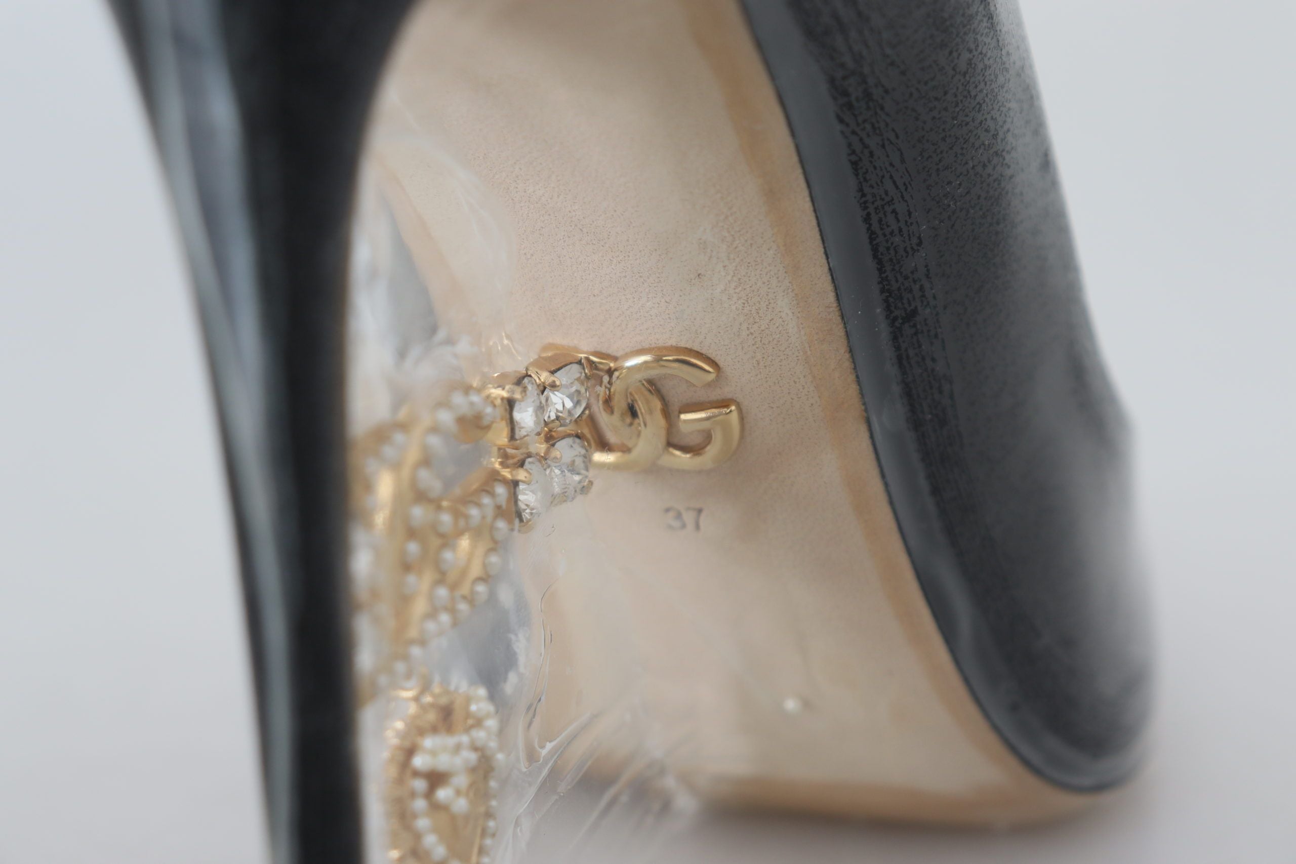 Dolce & Gabbana Schwarze Lederpumps Schuhe in Plastikfolie