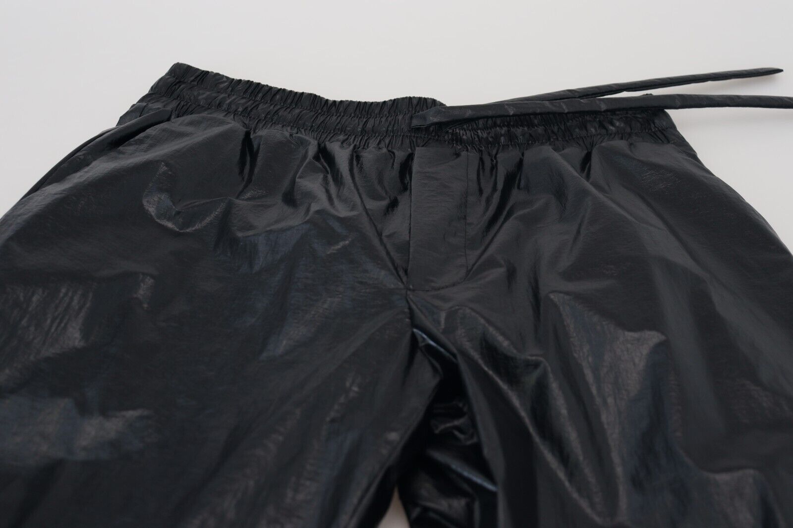 Dolce & Gabbana Schwarze glänzende Kordelzughose Nylonhose