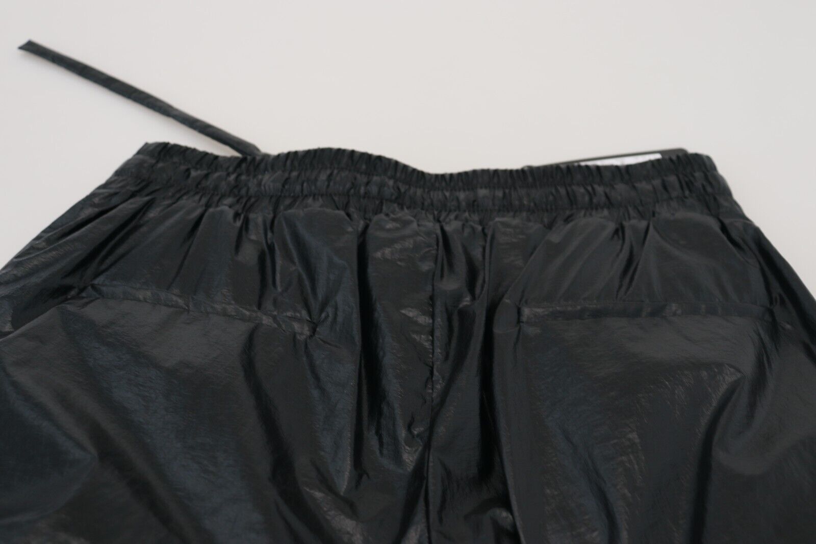 Dolce & Gabbana Schwarze glänzende Kordelzughose Nylonhose