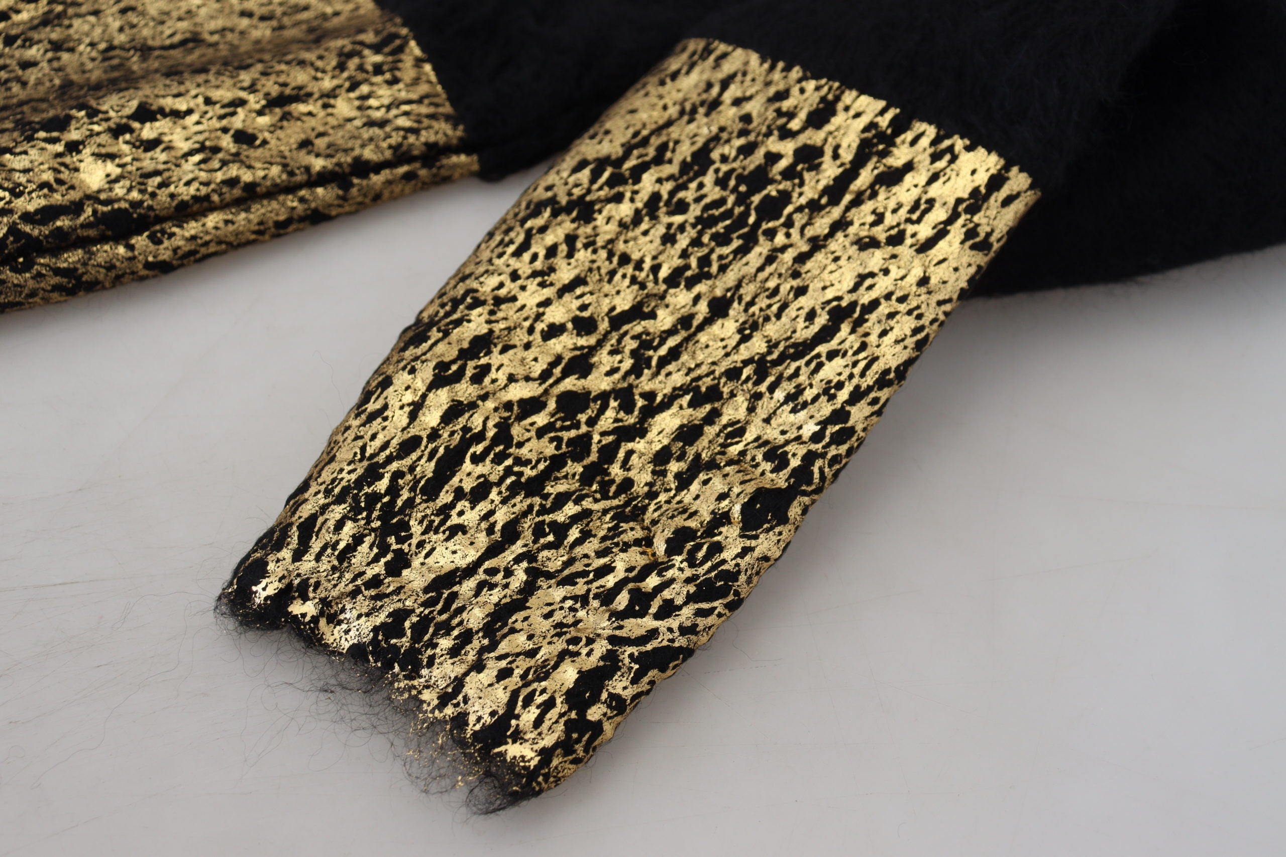 Dolce & Gabbana Schwarz-Gold-Rollkragenpullover aus Mohair Herrenpullover