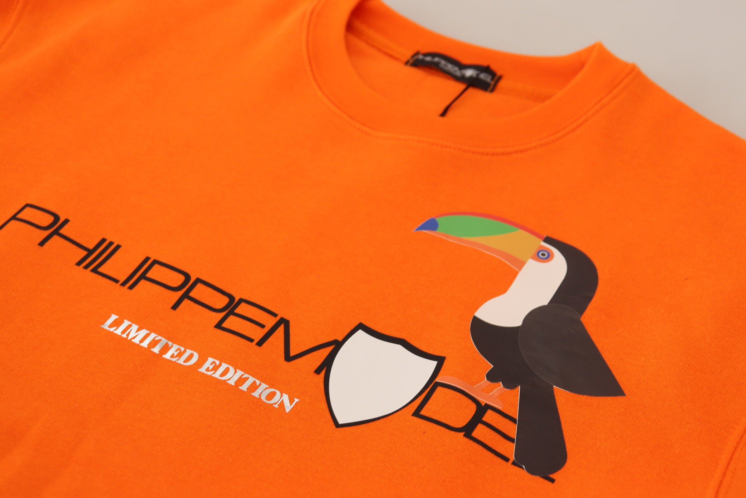 Philippe Model Orange bedruckter Pullover mit langen Ärmeln Pullover