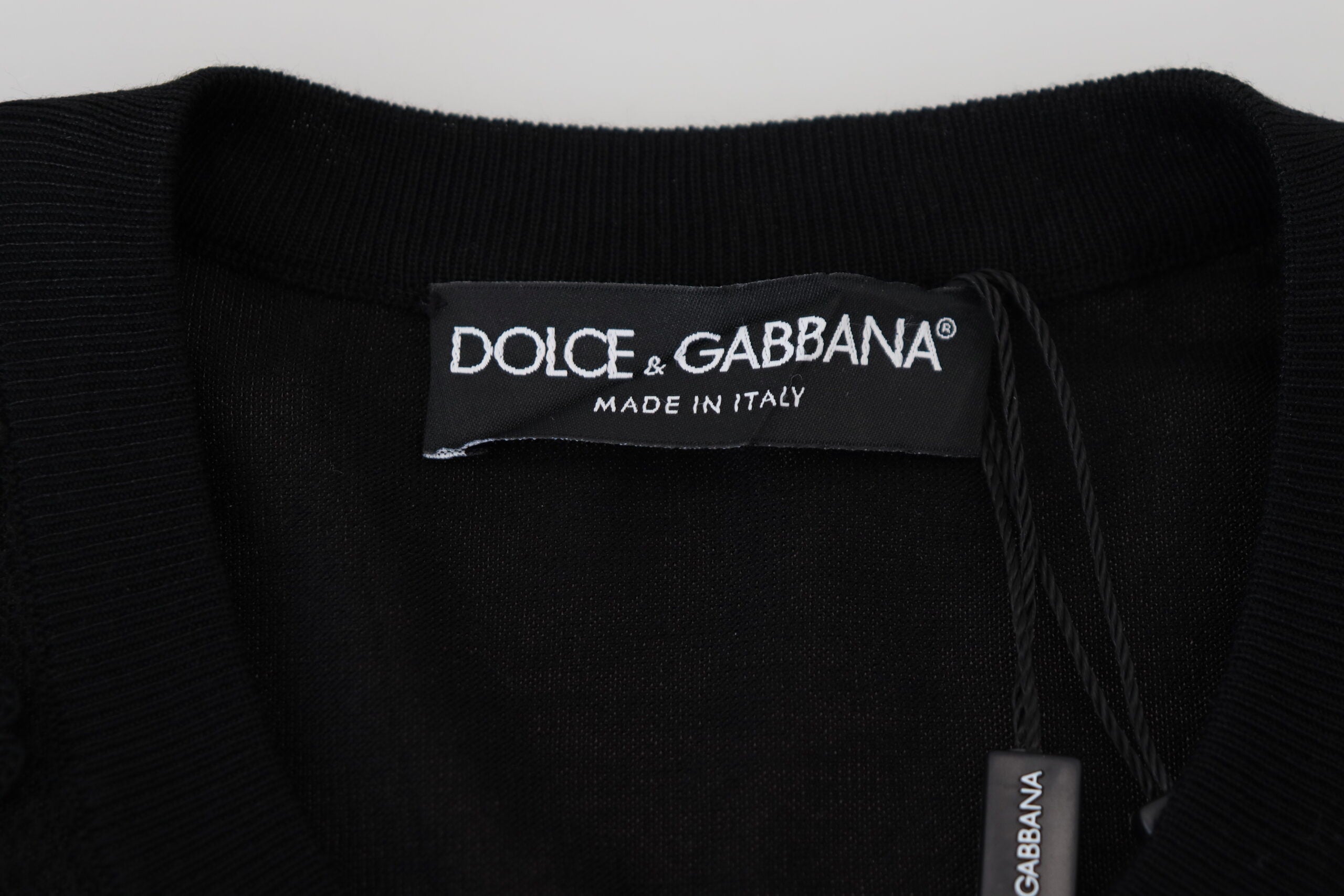 Dolce & Gabbana Schwarzer Strickpullover mit floraler Spitze und Knopfleiste