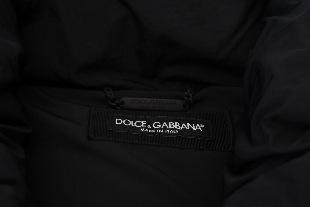 Dolce & Gabbana Schwarze ärmellose DG Jacke mit Metallverzierung