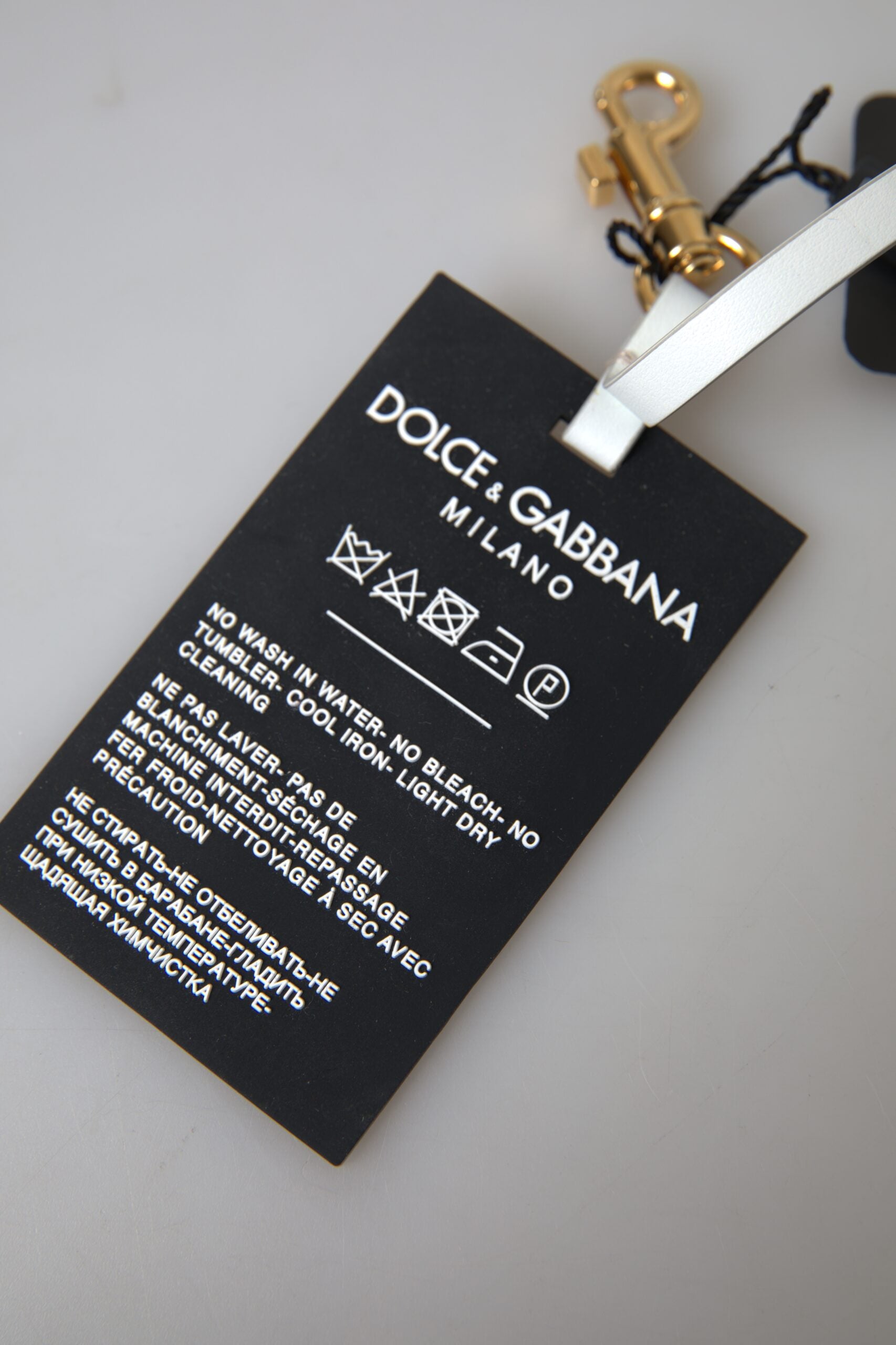 Dolce & Gabbana Schwarzes Silikon DG Logo Gold Messing Schlüsselanhänger