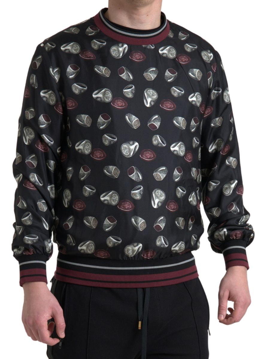 Dolce & Gabbana Schwarzer Ringdruck Seidenpullover mit Rundhalsausschnitt