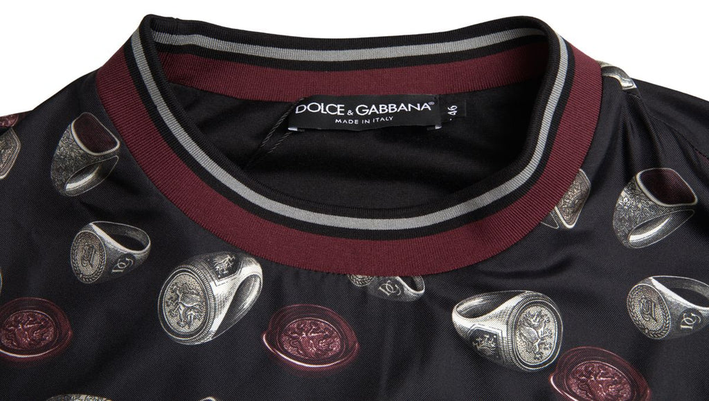 Dolce & Gabbana Schwarzer Ringdruck Seidenpullover mit Rundhalsausschnitt
