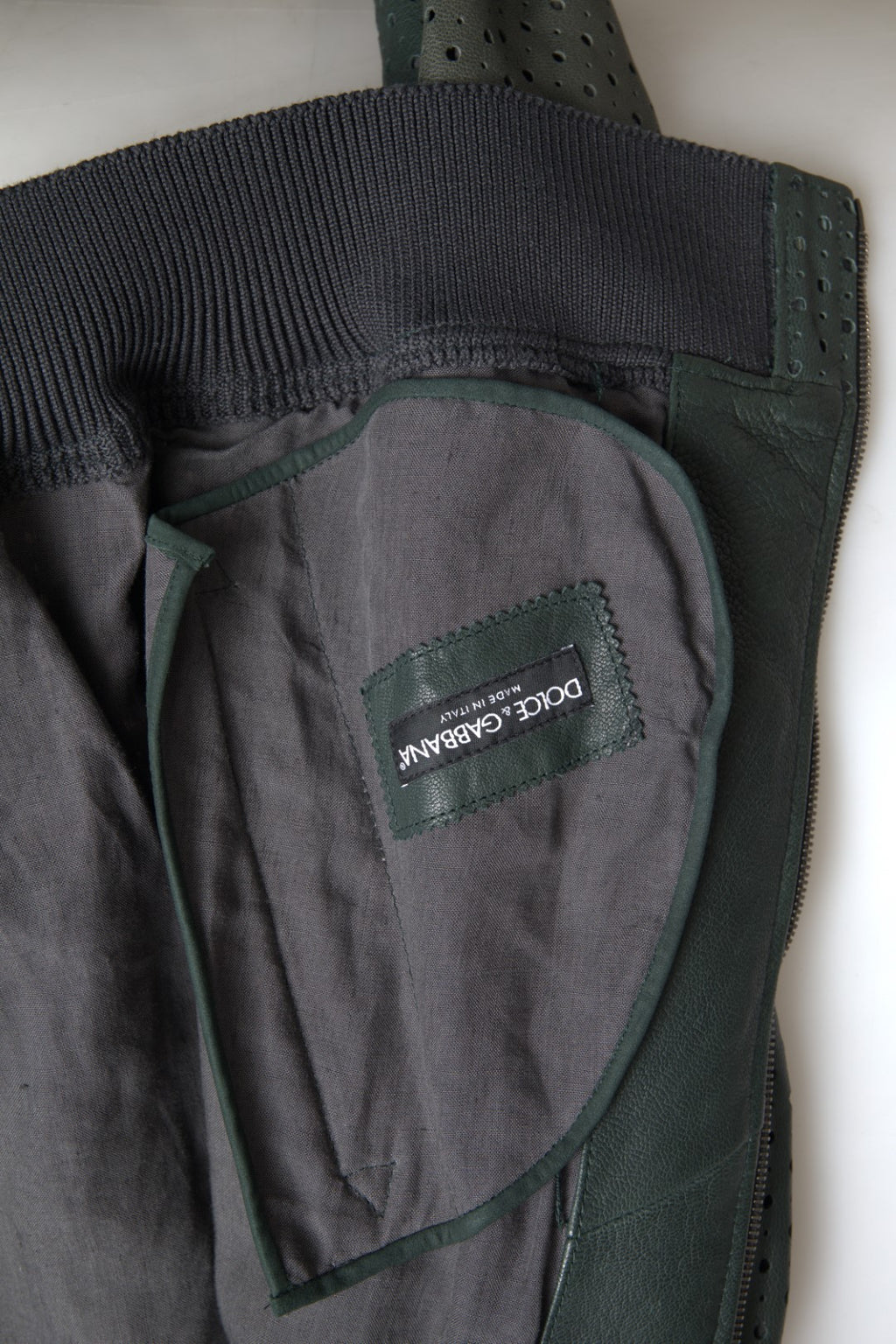 Dolce & Gabbana Grüne Bomberjacke aus Leder mit Perforation