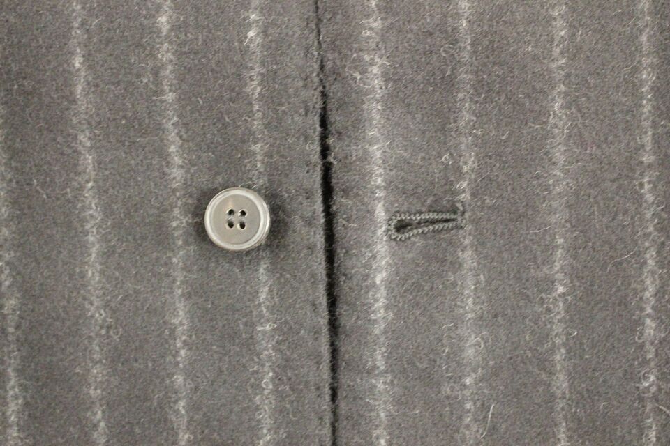 Dolce & Gabbana Schwarze gestreifte Wollweste mit Logo