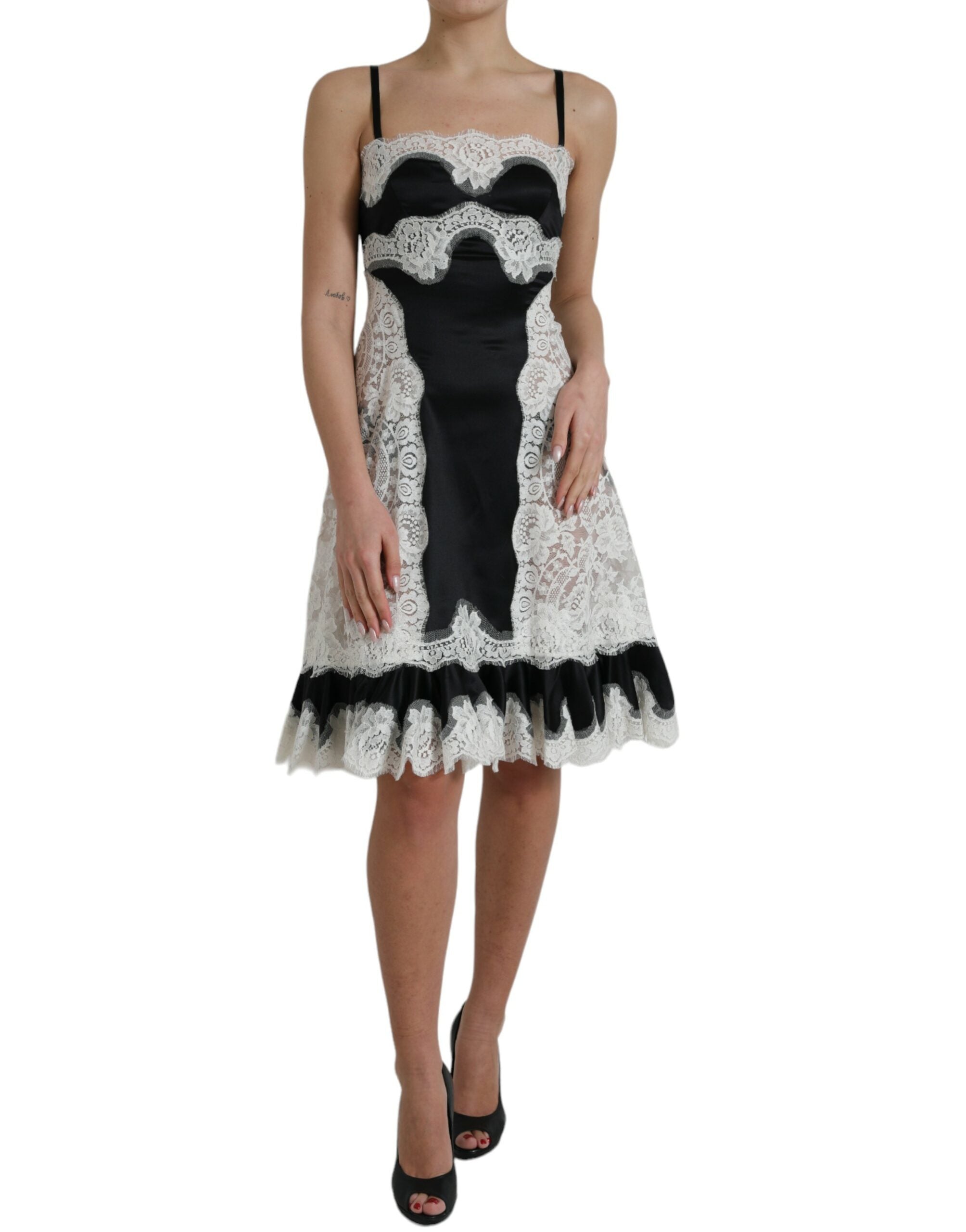 Dolce & Gabbana Schwarz-weißes ärmelloses Kleid aus Spitze mit A-Linie