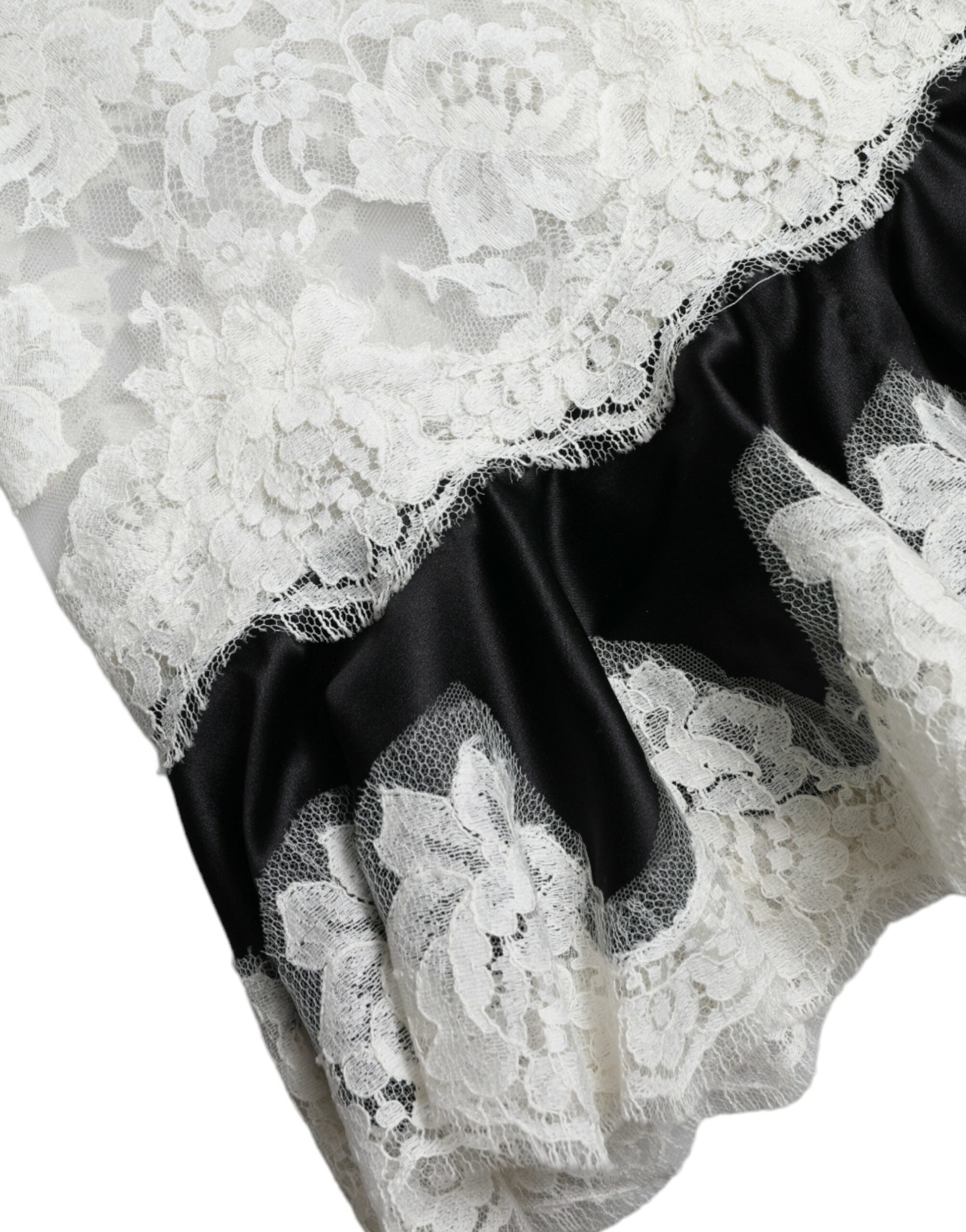 Dolce & Gabbana Schwarz-weißes ärmelloses Kleid aus Spitze mit A-Linie
