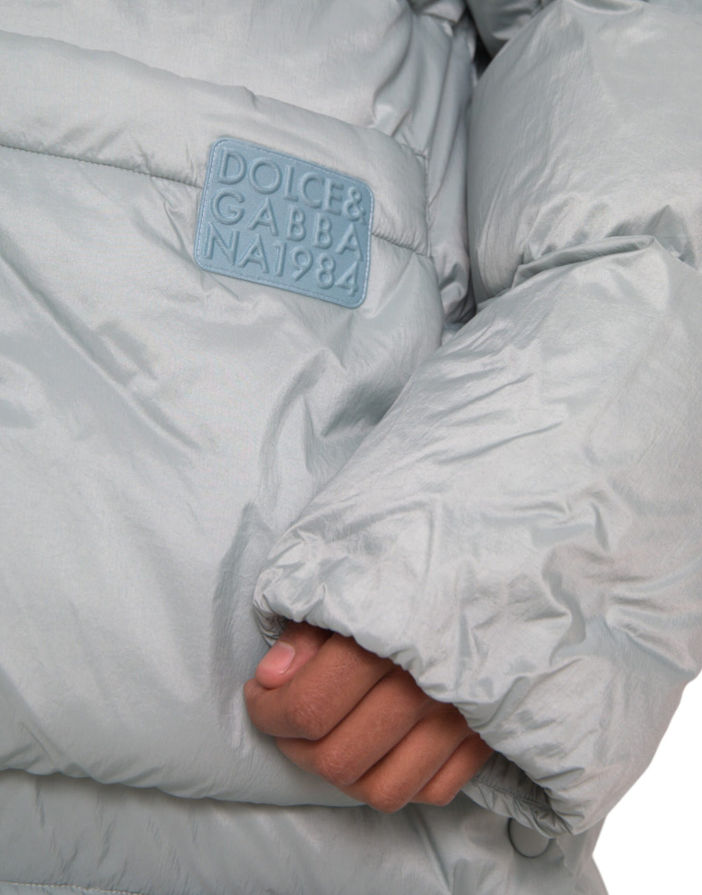 Dolce & Gabbana Hellblaue gesteppte Kapuzen-Pufferjacke Männer