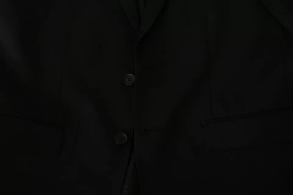 Dolce & Gabbana Schwarzer Blazer aus Wolle mit schmaler Passform und Reverskragen