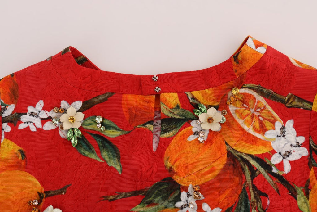 Dolce & Gabbana Orangefarbene Bluse mit Kristallverzierung