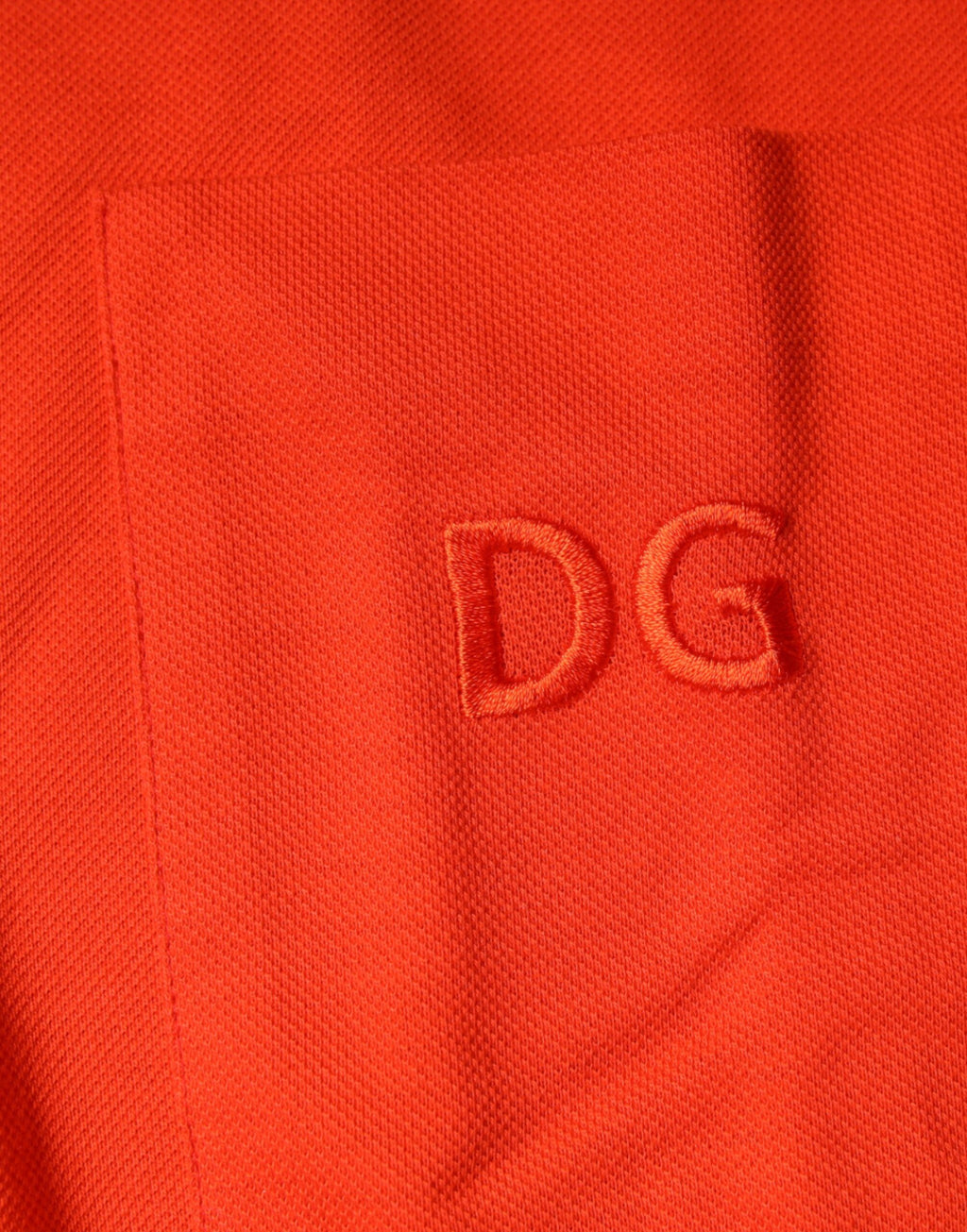 Dolce & Gabbana Orangefarbenes Baumwoll-Poloshirt mit Knopfleiste