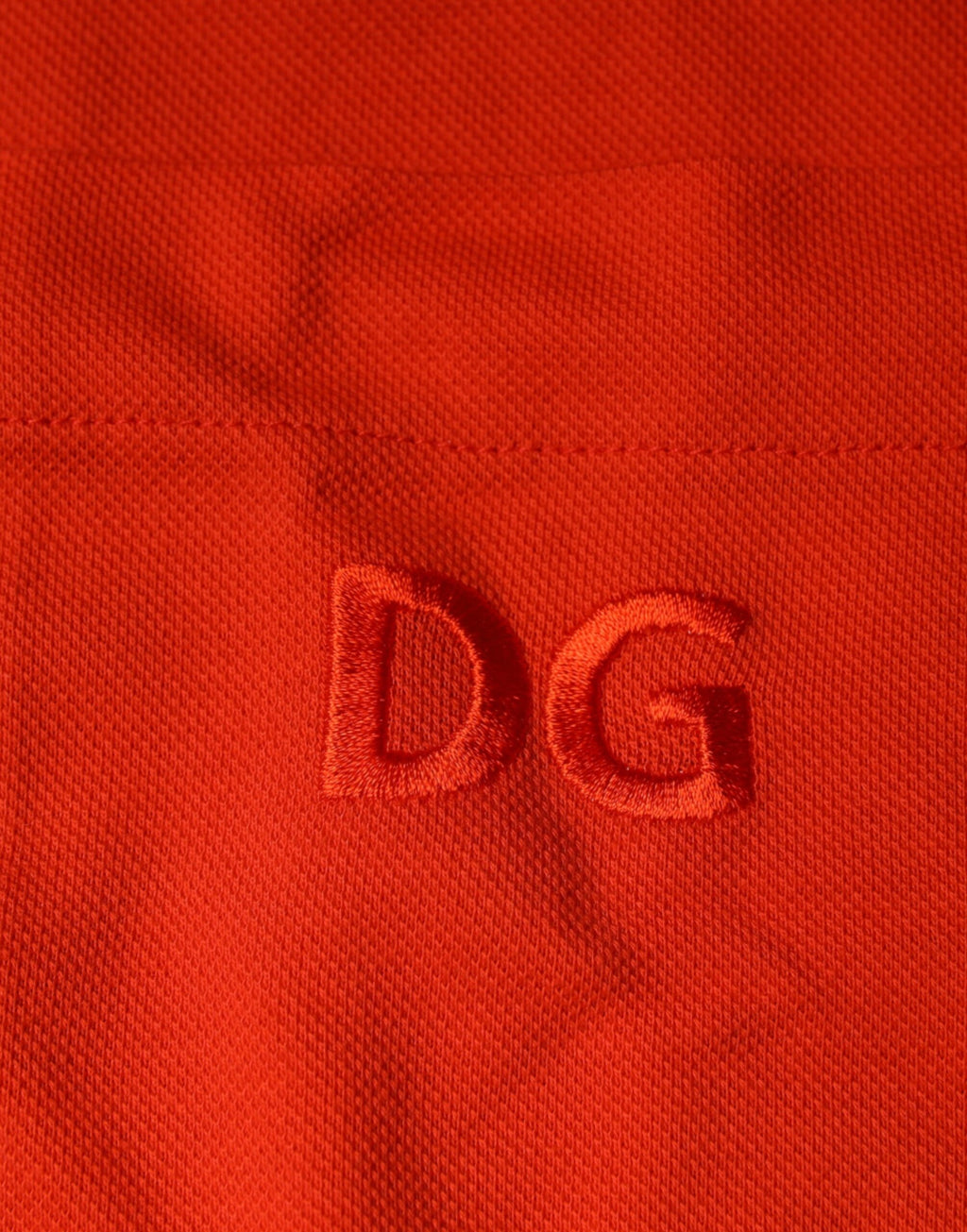 Dolce & Gabbana Orangefarbenes Baumwoll-Poloshirt mit Knopfleiste