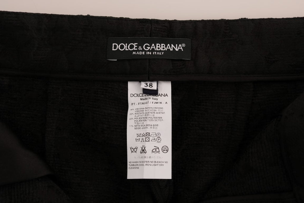 Dolce & Gabbana Schwarze Caprihose aus Brokat mit Blumenmuster