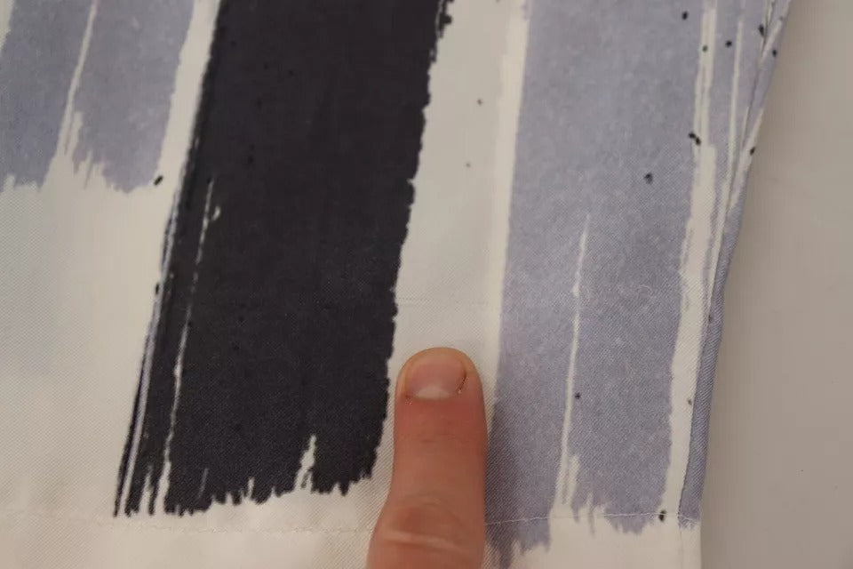 Dolce & Gabbana Blau gestreifte Seiden-Tapered Pants