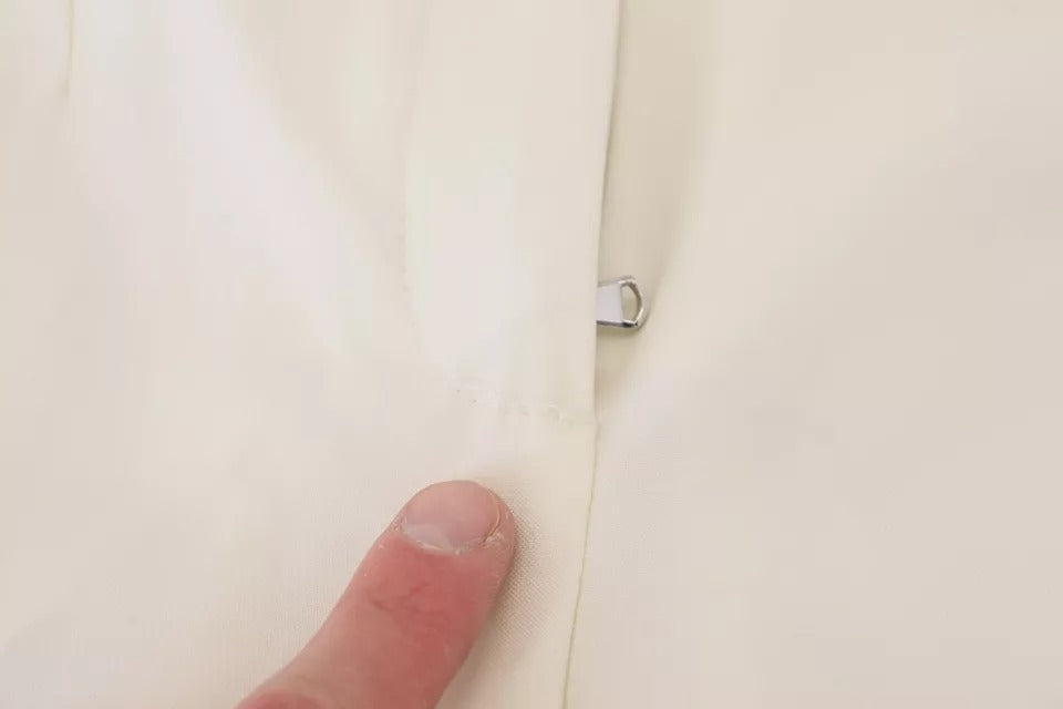 Dolce & Gabbana Weiße konisch zulaufende Wollhose mit hoher Taille