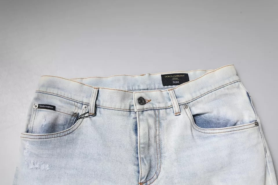 Dolce & Gabbana Hellblaue zerfledderte Skinny Denim Jeans aus Baumwollmischung