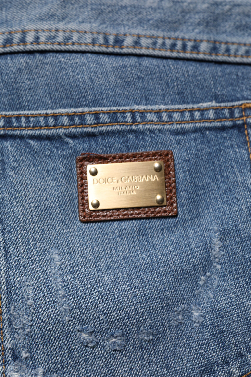 Dolce & Gabbana Blaue zerfledderte Straight Denim Jeans aus Baumwolle