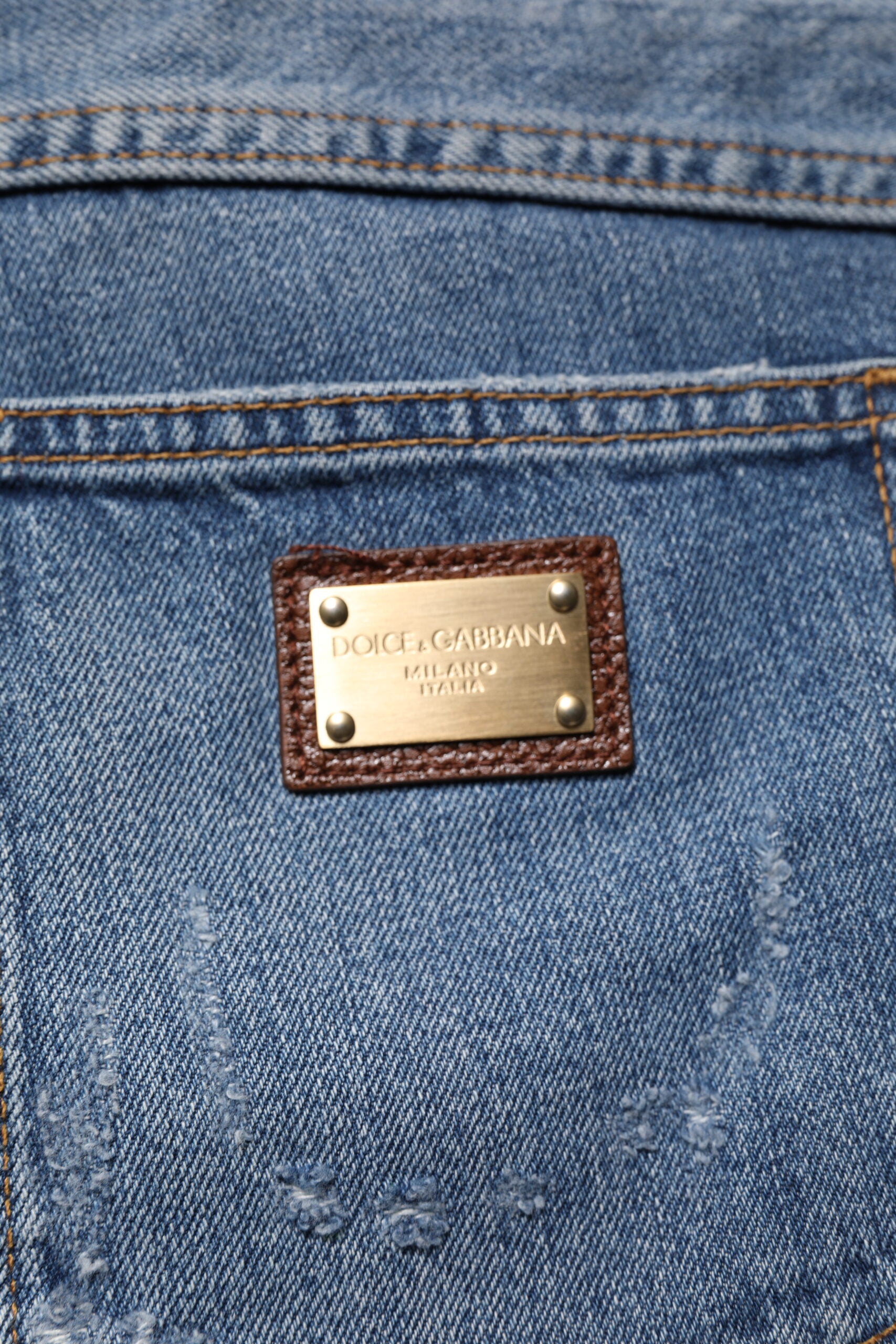 Dolce & Gabbana Blaue zerfledderte Straight Denim Jeans aus Baumwolle