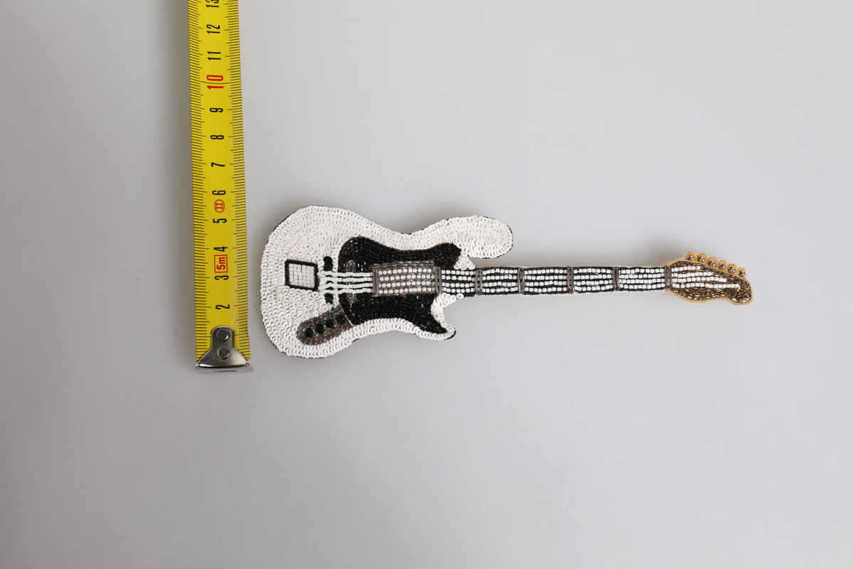 Dolce & Gabbana Brosche mit goldenem Messing-Logo, Perlen und Gitarre