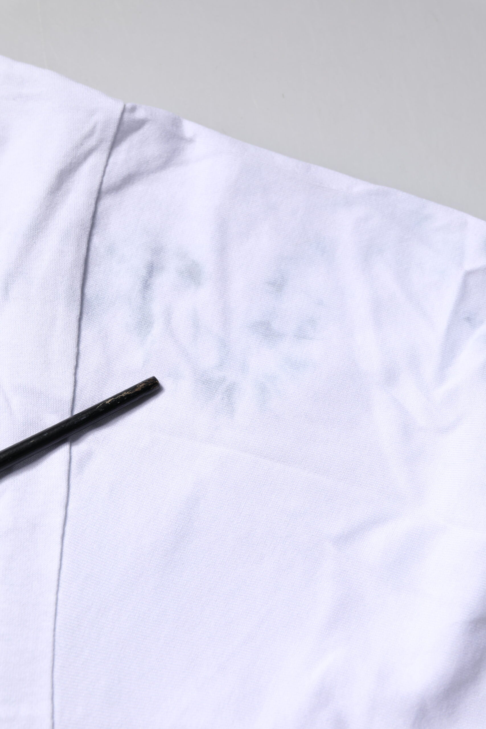 Dolce & Gabbana Weißes T-Shirt mit Rundhalsausschnitt und Schnürung aus Baumwolle