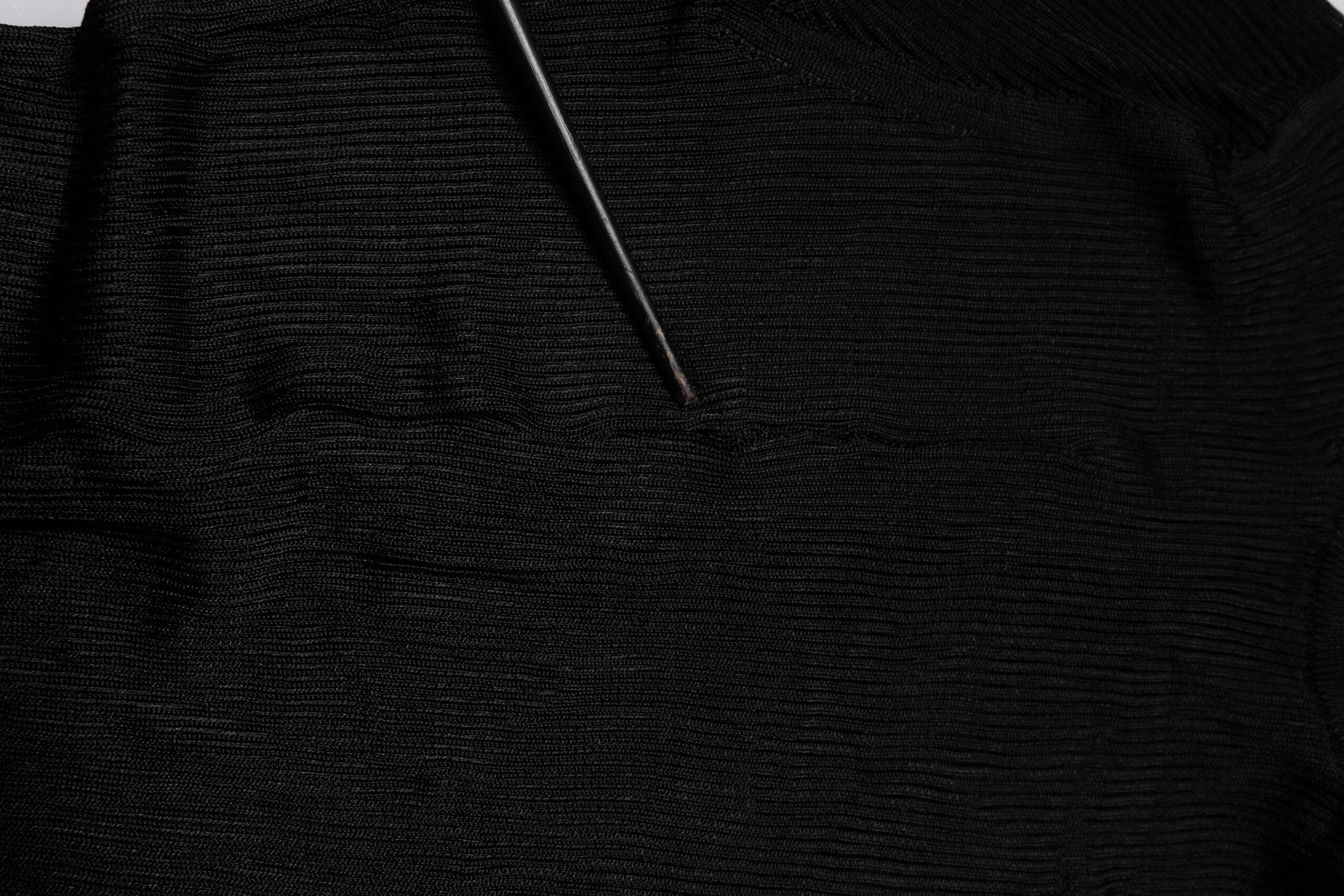 Dolce & Gabbana Schwarzes Strick-Top mit langen Ärmeln und schmalem Rollkragen