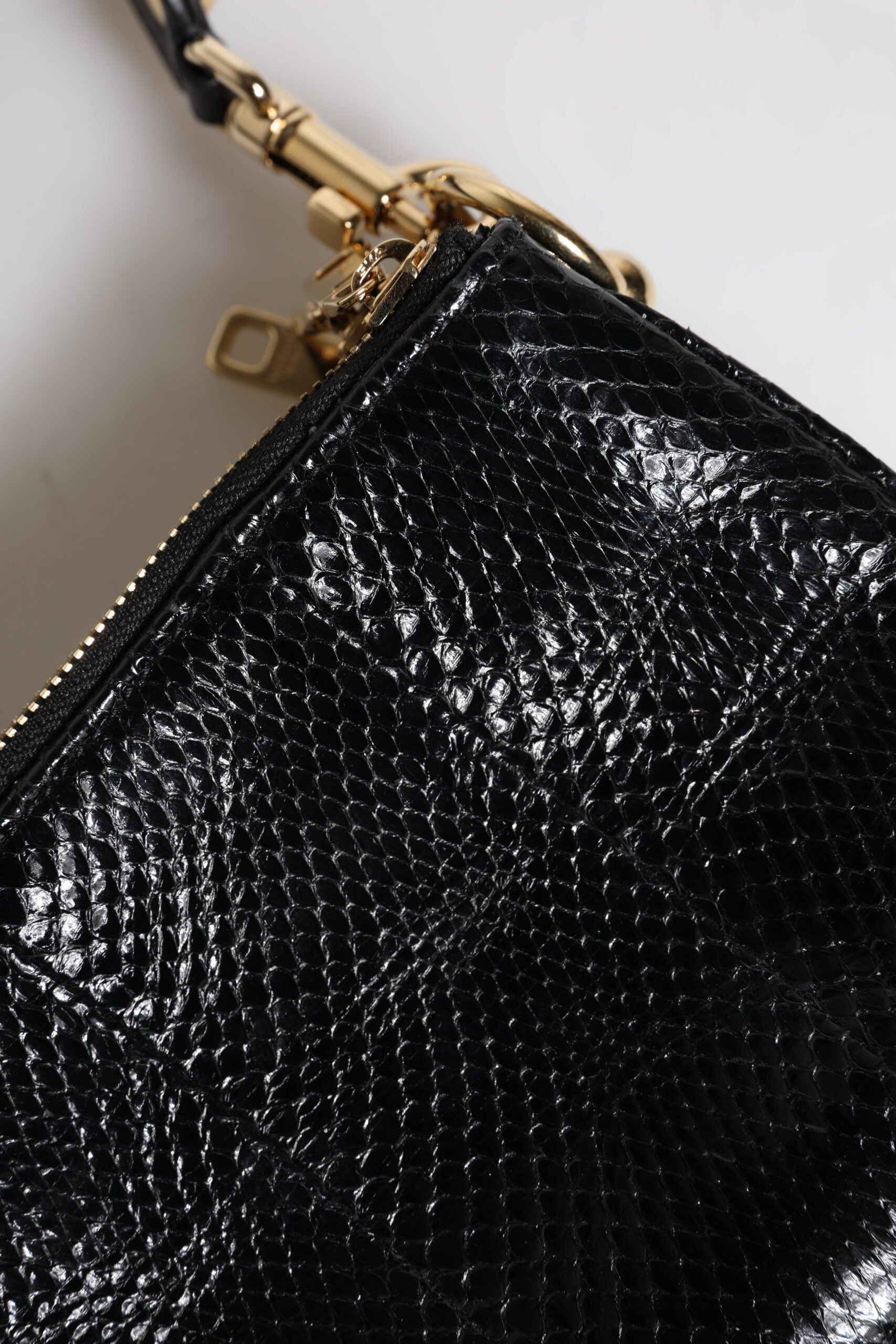 Dolce & Gabbana Schwarze Exotenleder-Schulterriemen-Clutch-Tasche