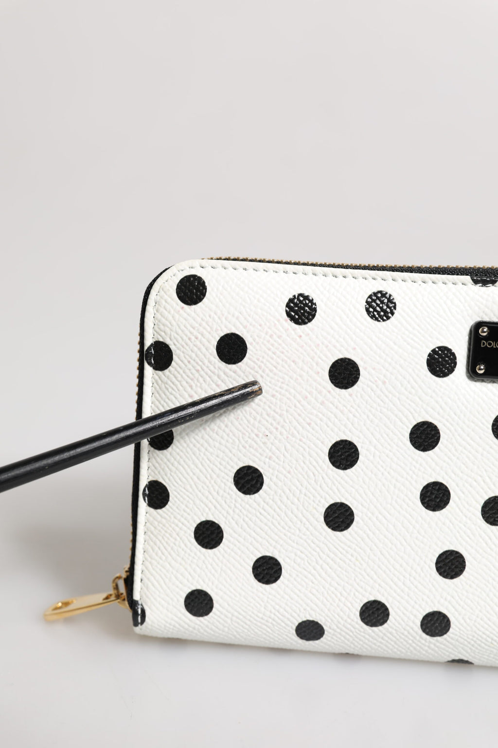 Dolce & Gabbana Weiß-schwarz gestreiftes Leder Portemonnaie mit Reißverschluss