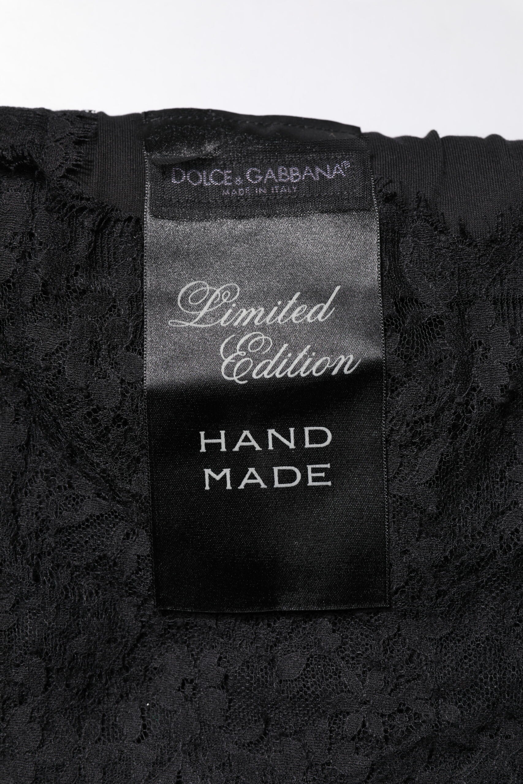 Dolce & Gabbana Schwarzes Top mit Rundhalsausschnitt aus transparenter Spitze Sacred Heart