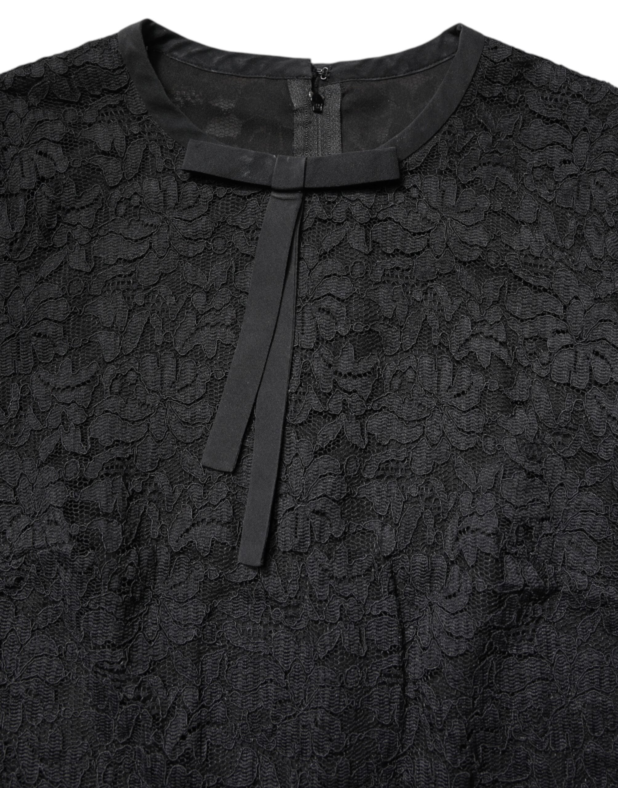 Dolce & Gabbana Schwarzes STAFF Top mit Rundhalsausschnitt und langen Ärmeln aus Spitze