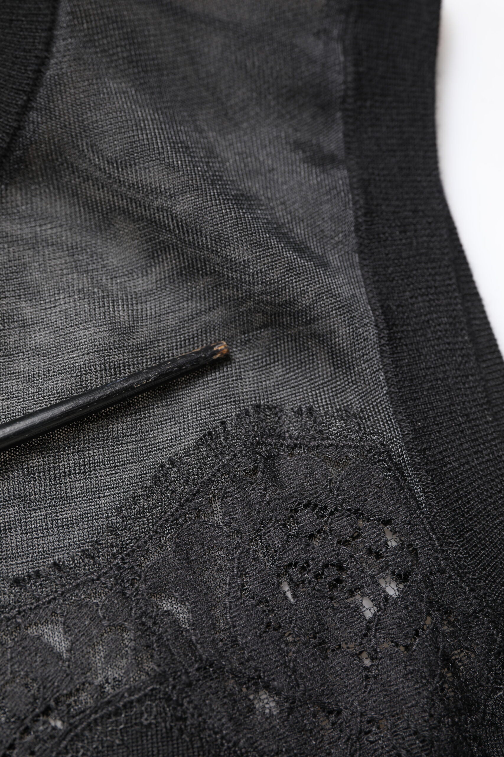 Dolce & Gabbana Schwarzes ärmelloses Top mit Rundhalsausschnitt aus Spitze