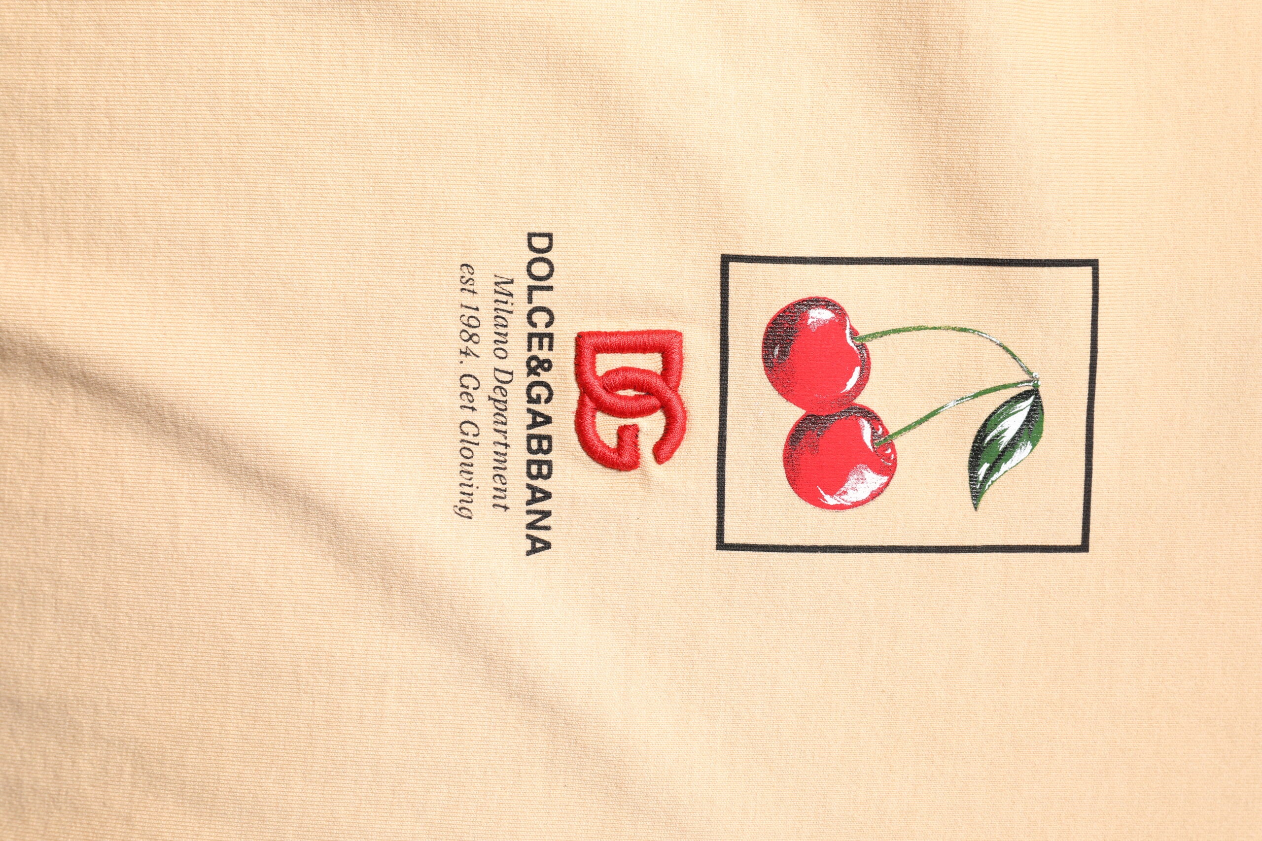 Dolce & Gabbana Beigefarbenes T-Shirt mit Rundhalsausschnitt und Logodruck aus Baumwolle