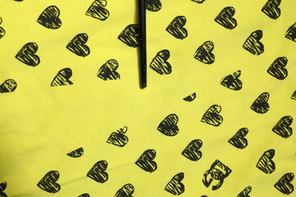 Dolce & Gabbana Gelbes T-Shirt mit Rundhalsausschnitt aus Baumwolle DG Heart Print