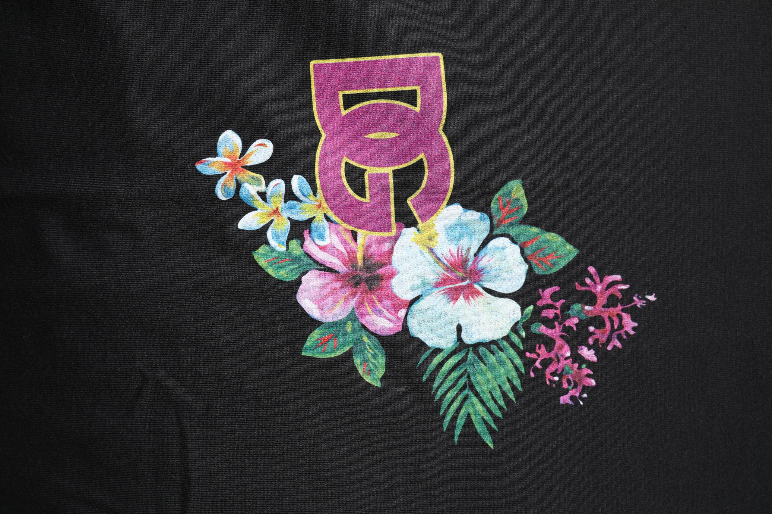 Dolce & Gabbana Schwarzes DG T-Shirt mit Blumendruck und Rundhalsausschnitt