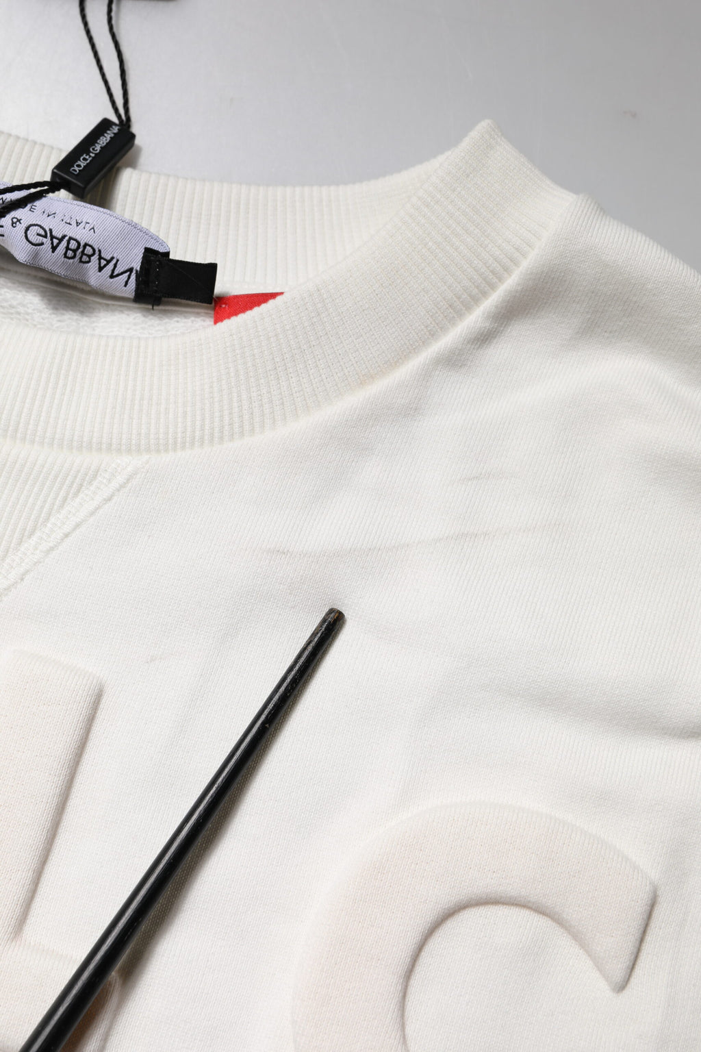 Dolce & Gabbana Weißer Rundhalspullover aus Baumwolle mit Logoprägung