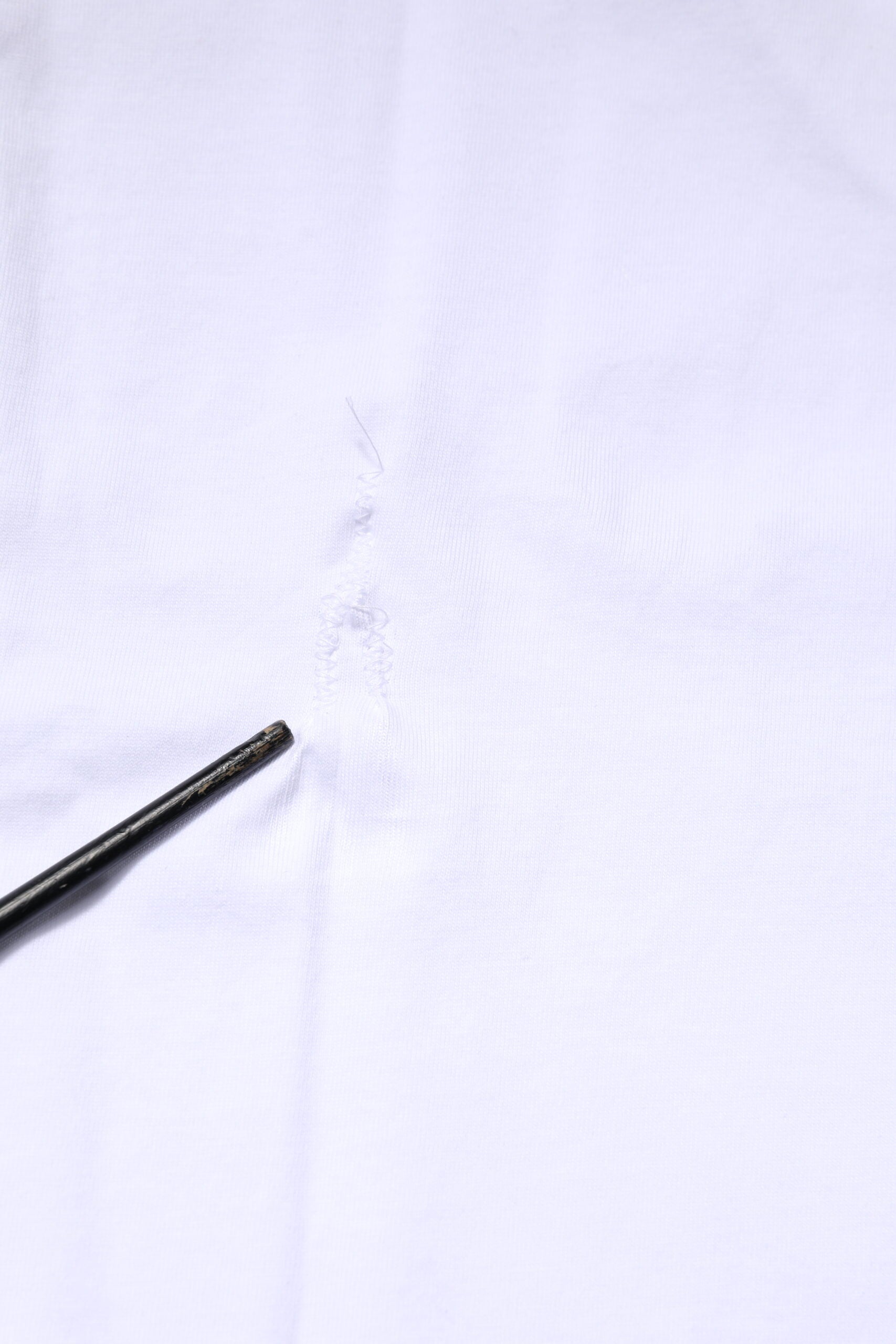 Dolce & Gabbana Weißes T-Shirt mit Rundhalsausschnitt und Logo-Patch aus Baumwolle