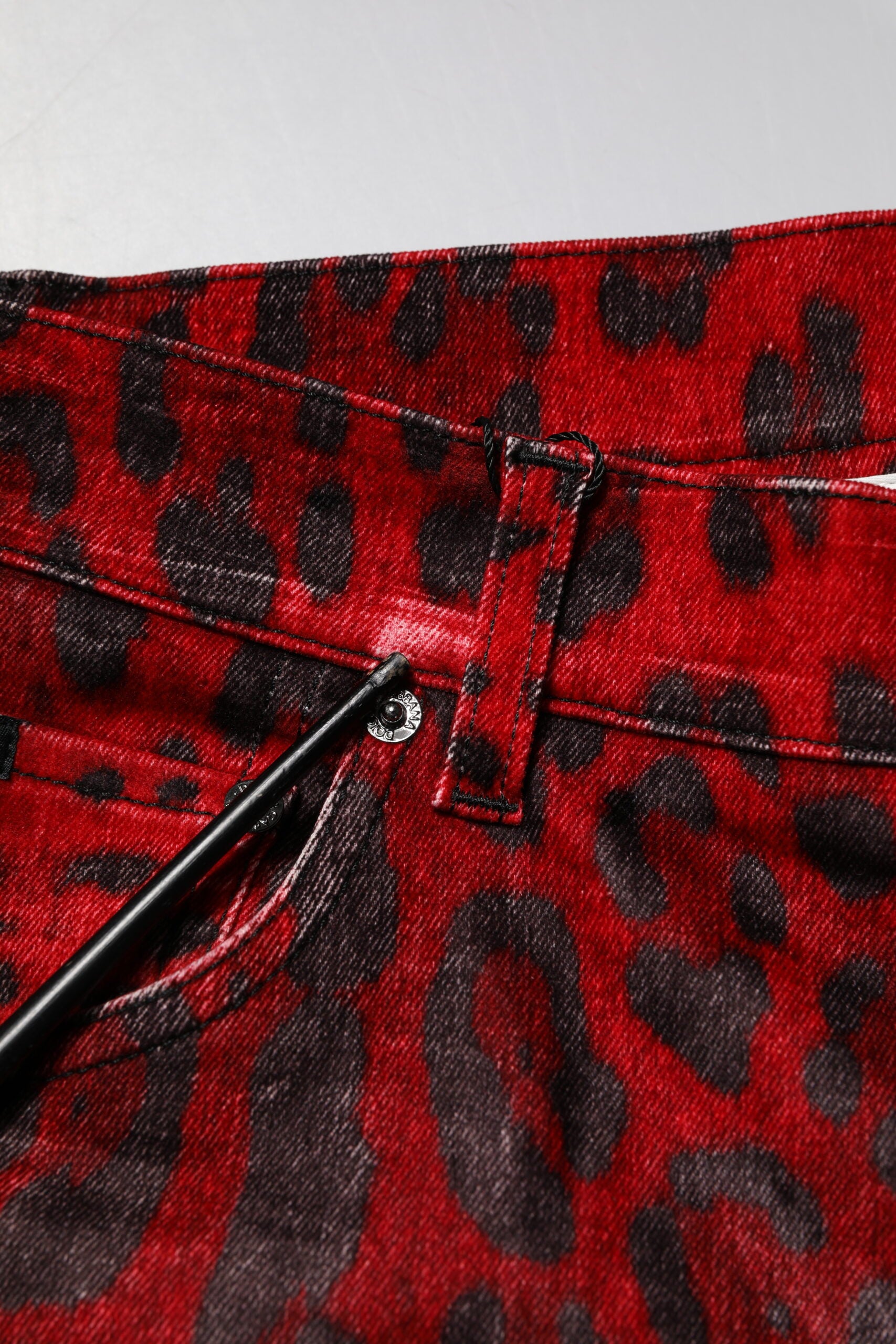 Dolce & Gabbana Rote Skinny Denim Jeans mit Leopardenmuster aus Baumwolle