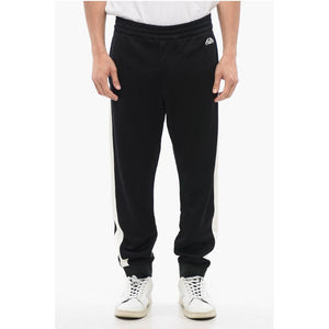 Alexander McQueen Sweatpants aus Baumwollmischgewebe mit Seitenbändern