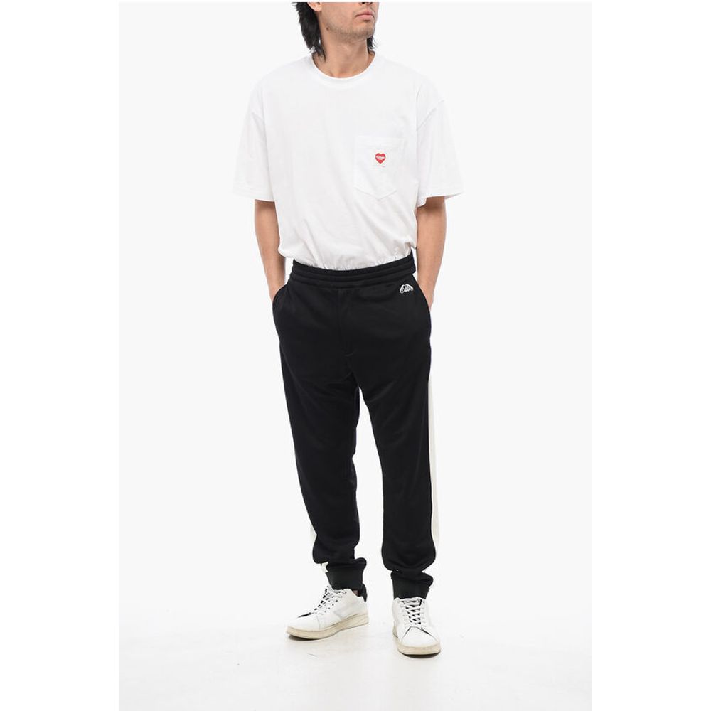 Alexander McQueen Sweatpants aus Baumwollmischgewebe mit Seitenbändern