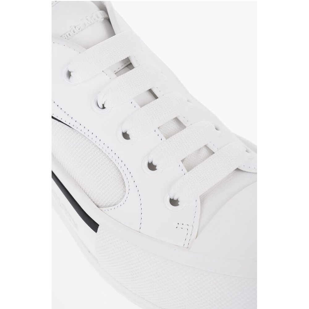 Alexander McQueen Einfarbige Low-Top-Sneakers aus Leder und Segeltuch