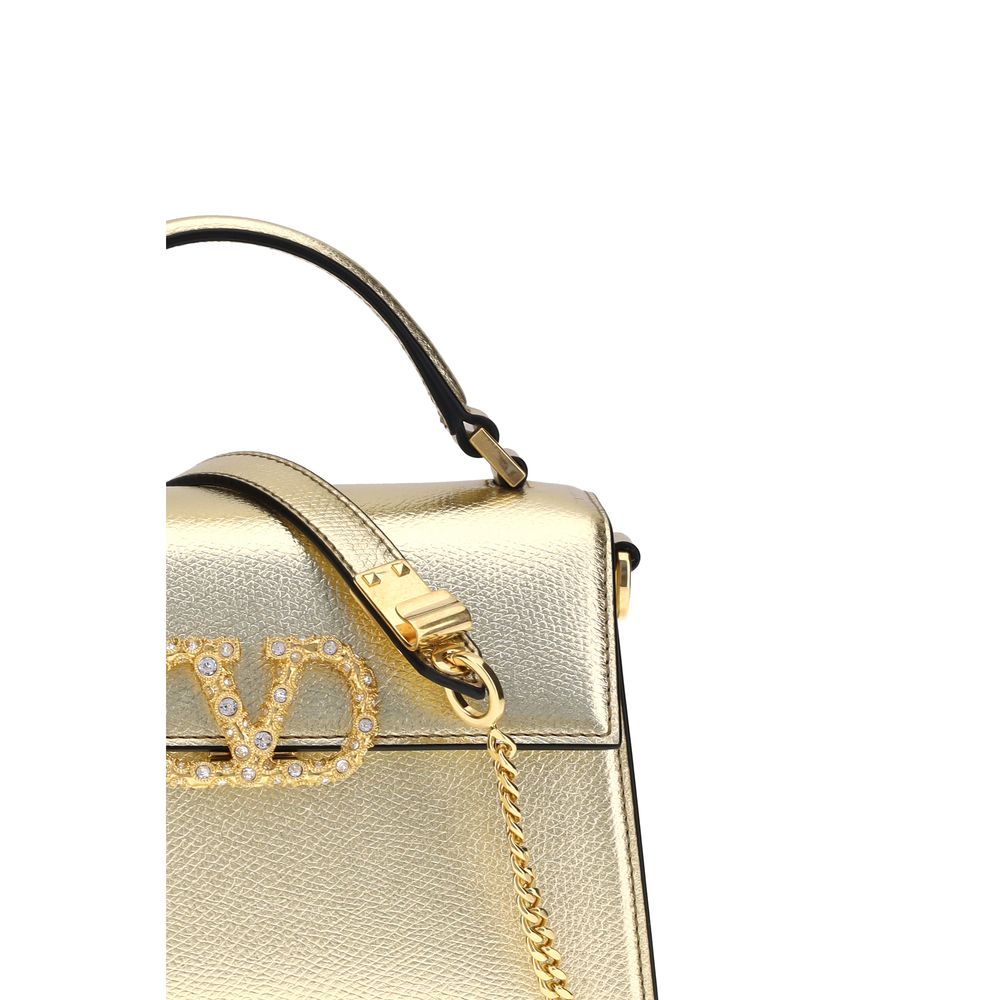 Valentino Garavani Metallische granatfarbene Mini-Handtasche