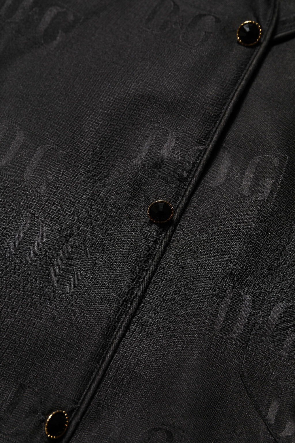 Dolce & Gabbana Schwarzes Seiden-DG besticktes langärmeliges Top