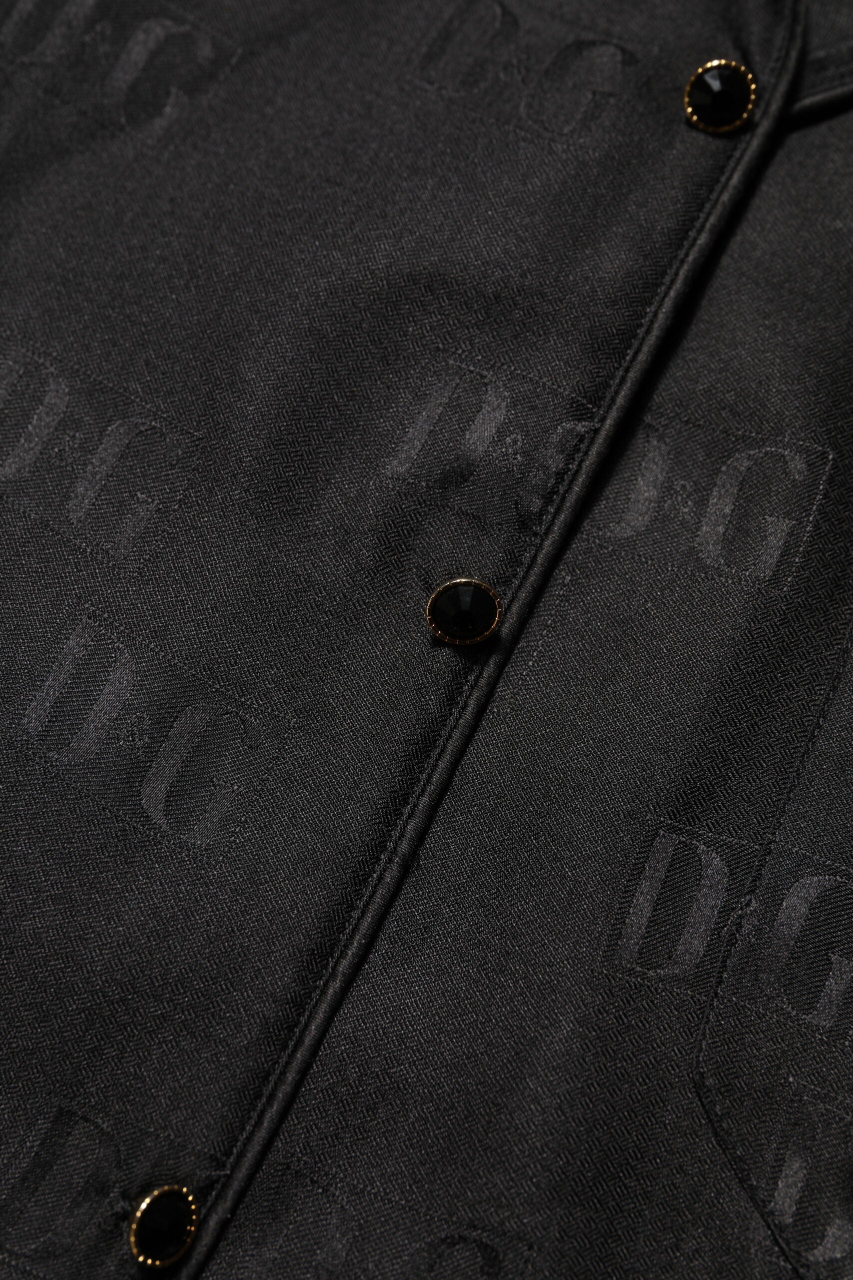 Dolce & Gabbana Schwarzes Seiden-DG besticktes langärmeliges Top