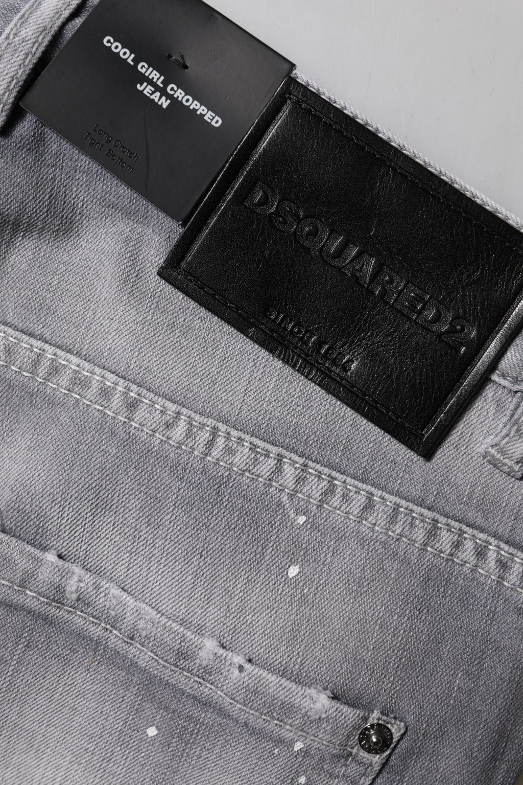 Dsquared² Graue verwaschene Jeans mit mittlerer Taille, konisch zulaufend